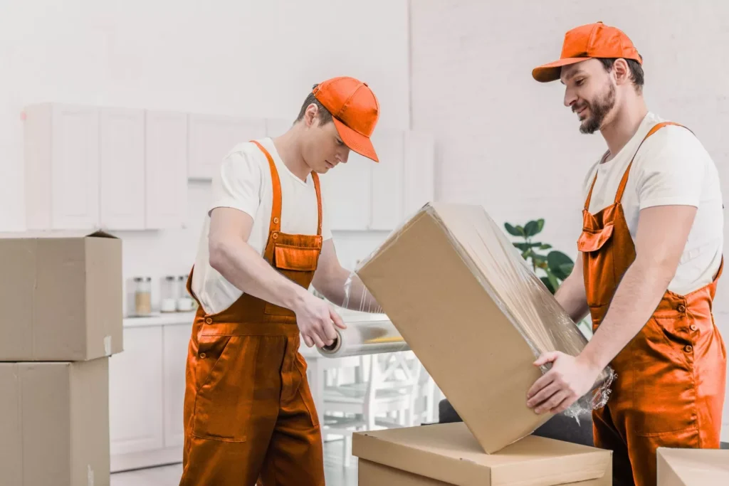 Professional villa movers in Dubai packing furniture carefully